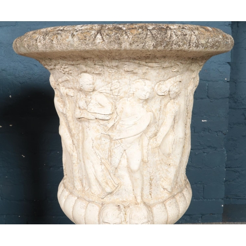 319 - A large pair of cast concrete Medici style garden urns, with classical decoration, on fluted socle b... 