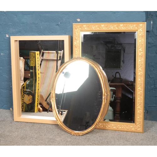 324 - Three wall mirrors including two gilt framed examples.