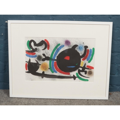 332 - After Joan Miro (1893-1983), a framed lithograph with centrefold. 31cm x 48cm.