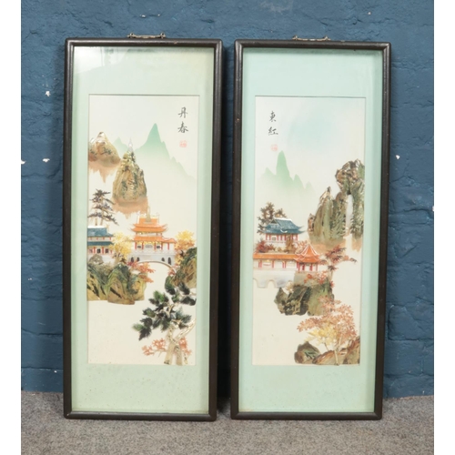 338 - A pair of large Chinese pictures, landscape scenes with applied decoration.