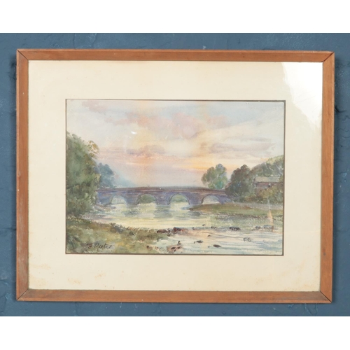 349 - JF Slater, a framed watercolour, landscape scene with a bridge. 23cm x 33cm.