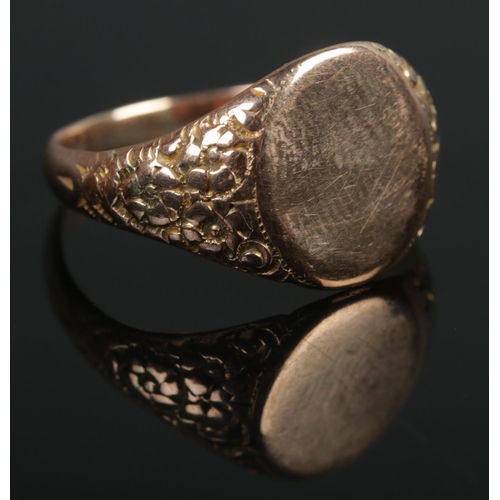 355 - A 9ct Gold signet ring, assayed in Chester. With blank cartouche and part floral decoration to band.... 