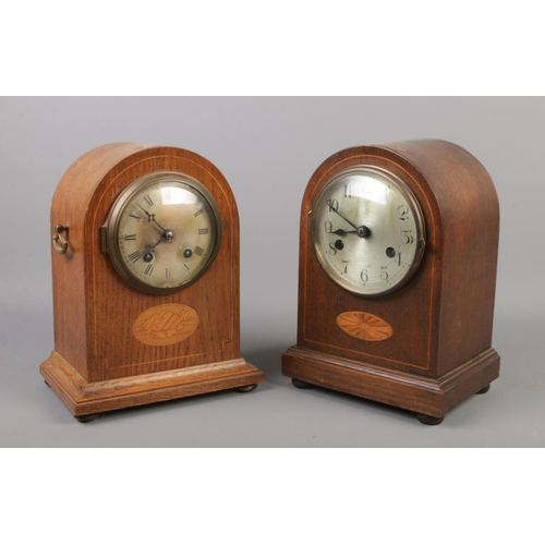 66 - Two Edwardian dome top mantel clocks both having inlaid decoration.