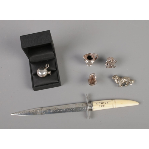 366 - A silver bladed letter opener in the form of a dagger stamped Edwige 1921 to hilt (Assayed Birmingha... 