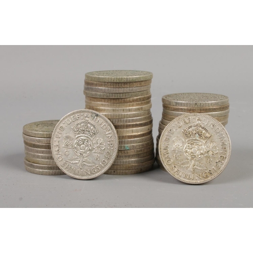 368 - A quantity of post-1920, pre-1947 two shilling coins. Total weight 482g.