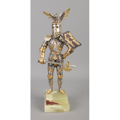 67 - A Gippe Vasani style figure of a medieval knight with removable helmet. Approx. 27cm tall. Stamped 1... 