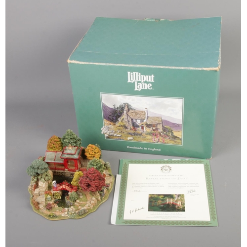 381 - A boxed Lilliput Lane Reflections of Jade limited edition figure. No. 3546/3950 with certificate of ... 