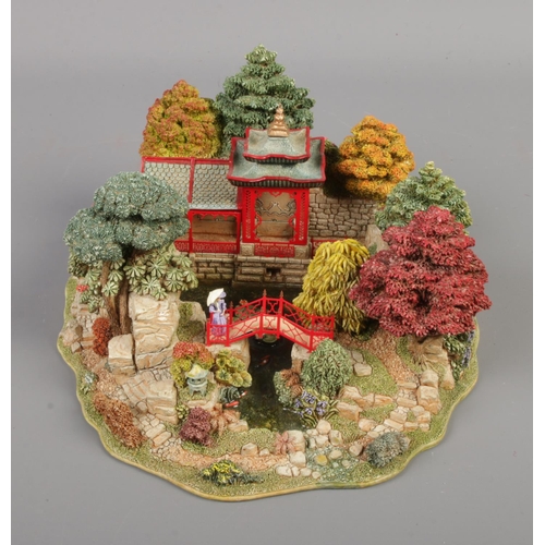 381 - A boxed Lilliput Lane Reflections of Jade limited edition figure. No. 3546/3950 with certificate of ... 