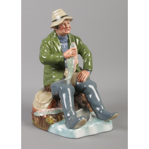 384 - A Royal Doulton figure; titled 'A Good Catch' HN2258