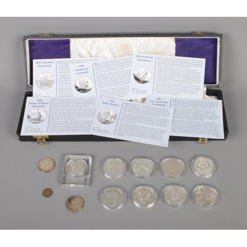 391 - A collection of commemorative silver proof dollars with certificates including 1986 Statue of Libert... 