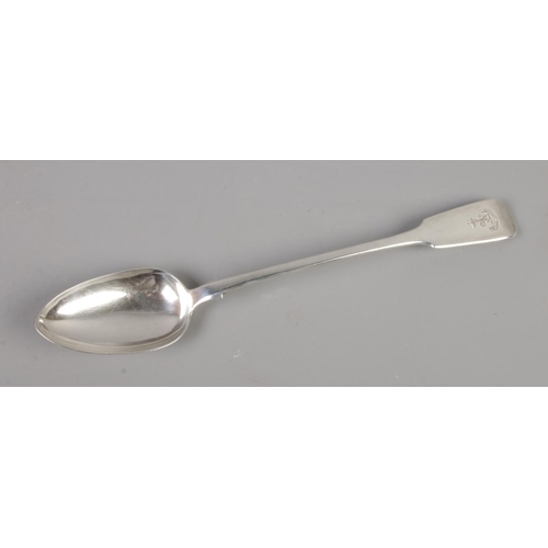 398 - A William Eaton silver basting spoon featuring lion crest to handle. Assayed London 1843. Total weig... 