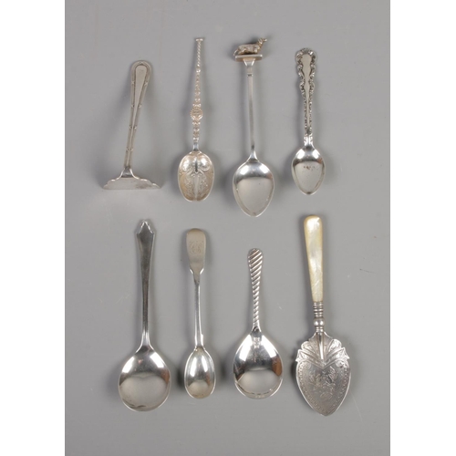 401 - Seven silver spoons, including mother of pearl handled example, and one silver pusher. Hallmarks var... 