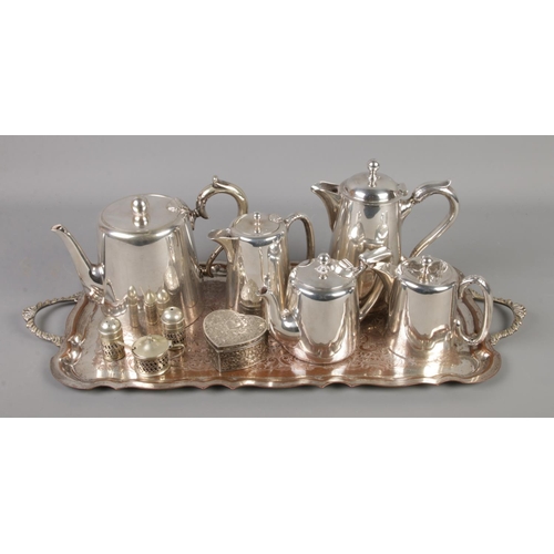 86 - A collection of silver plated items. Includes CRB A1 silver on copper tray, cruet set, Roberts & Bel... 