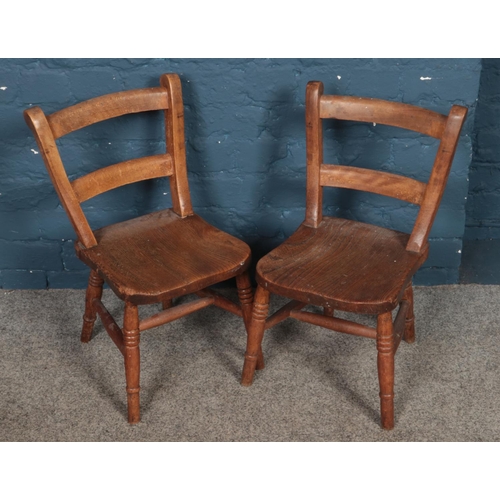 415 - Two oak child's chairs.