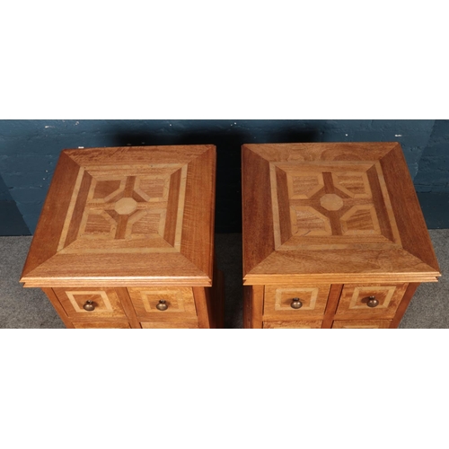 418 - A pair of modern bedside drawers featuring six drawers, inlay decoration to top and drawers. Approx.... 