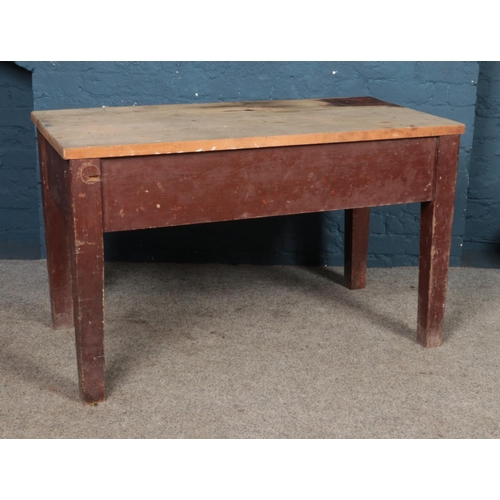 421 - A pine work table. Approx. dimensions 72cm x 119cm x 59cm.