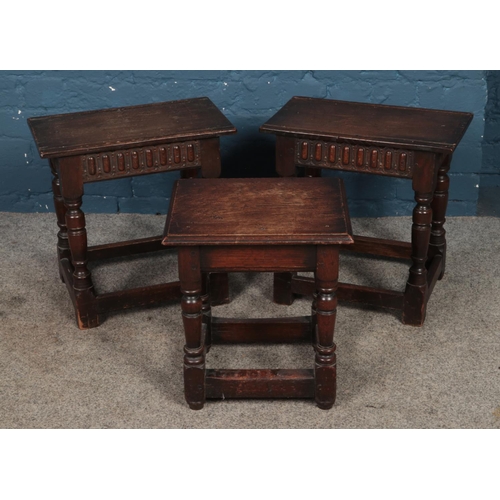 426 - Three oak small occasional tables.