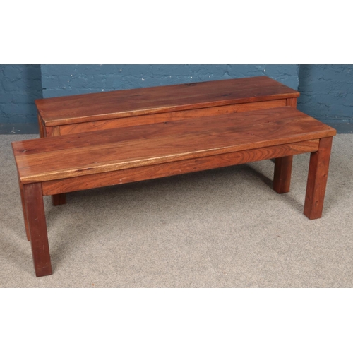 434 - Two modern hardwood benches. Length: 138cm.