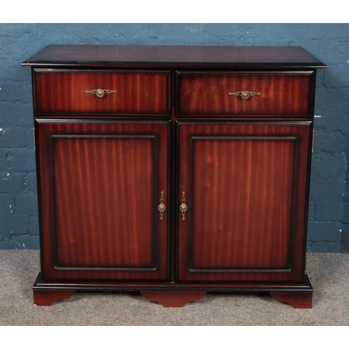 457 - A modern hardwood sideboard.