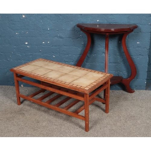 471 - A teak tile top coffee table along with a hardwood side table.