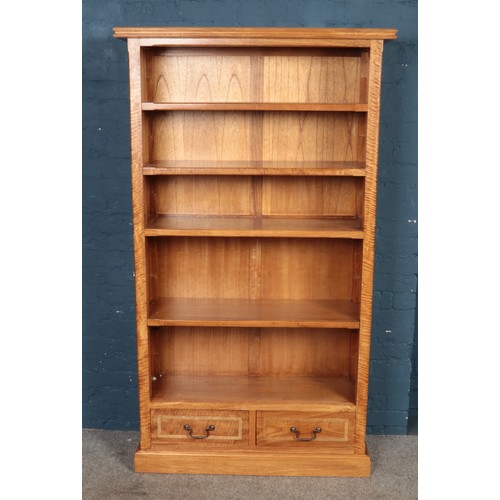 419 - A modern open fronted bookcase with two lower drawers featuring inlay decoration. Approx. dimensions... 