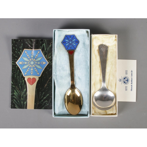 338 - A silver Georg Jensen spoon commemorating 100 years of the Danish Sugar factory along with A. Michel... 