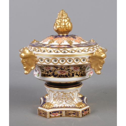 411 - A Royal Crown Derby lidded pot pourri bowl, in the Imari pattern with gilt decoration and quarter ma... 