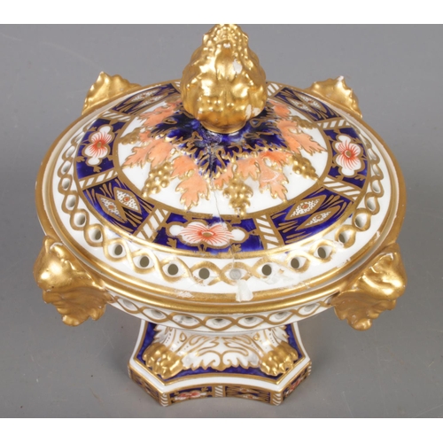 411 - A Royal Crown Derby lidded pot pourri bowl, in the Imari pattern with gilt decoration and quarter ma... 