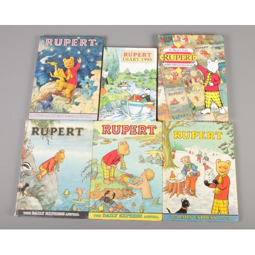 495 - A collection of Rupert books. Includes four annuals (1969, 1974, 1975, 1979), George Perry A Bear's ... 