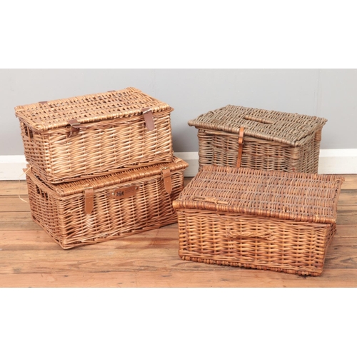 241 - Four wicker baskets.