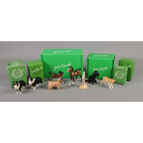 64 - A collection of boxed Beswick figures including Meerkat, Goat, Foals, Sheepdogs, etc.