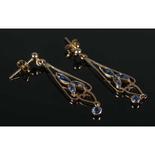 297 - A pair of 9ct Gold droplet earrings, set with translucent blue stones. Total weight: 1.7g.