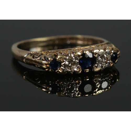 327 - An 18ct Gold Sapphire and Diamond five stone diamond ring. Size N. Total weight: 4.4g.