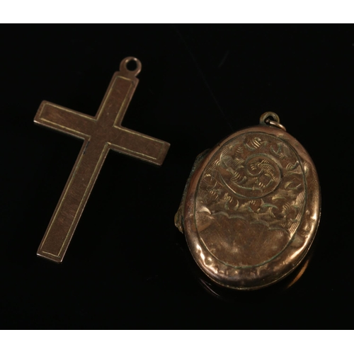 332 - A 9ct locket and cross pendant. 3.9g