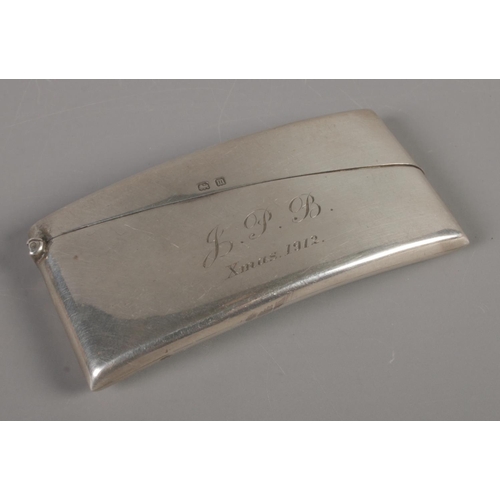 335 - A George V silver vesta case in rectangular form. Assayed for Birmingham, 1911, by John Rose. Total ... 