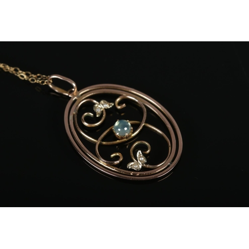 351 - An Edwardian 9ct Gold, Moonstone and Pearl pendant on 9ct Gold chain. Total weight: 2.9g.