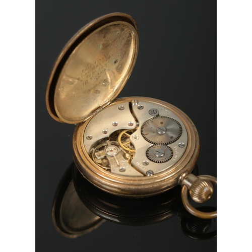 352 - A yellow metal pocket watch, with Swiss made 15 jewel movement, on yellow metal double albert chain.... 