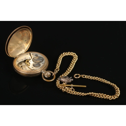 352 - A yellow metal pocket watch, with Swiss made 15 jewel movement, on yellow metal double albert chain.... 