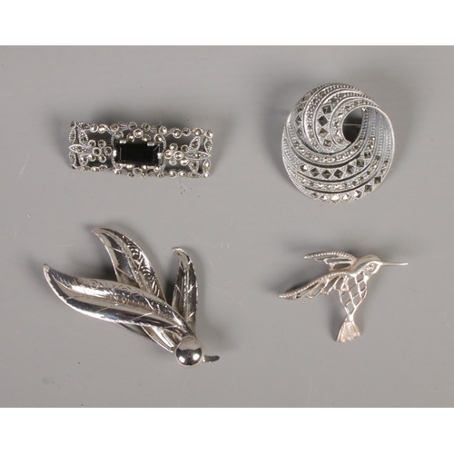 376 - Four silver brooches including hummingbird example and one hallmarked Birmingham 1967.