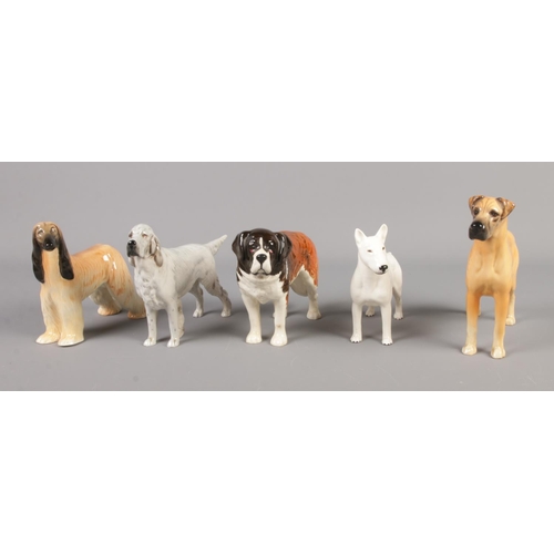 391 - Five Beswick dog figures including Great Dane, Afghan Hound, St. Bernard, etc.