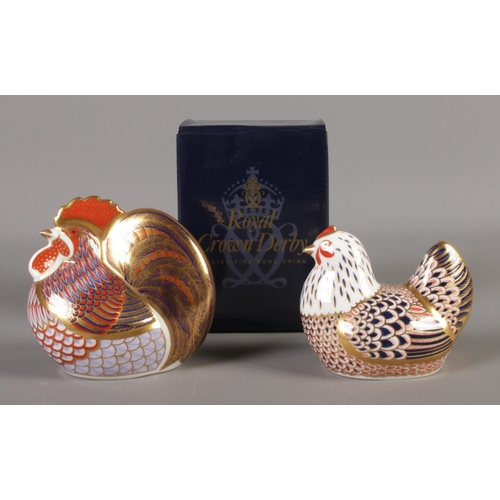 399 - Two Royal Crown Derby paperweights; Cockerel (boxed) and Chicken. Dated 1995 and 1992. Both with gol... 