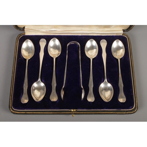 403 - A cased set of silver coffee spoons and sugar tongs. Assayed for Glasgow 1906 & 1907 by R & W Sorley... 