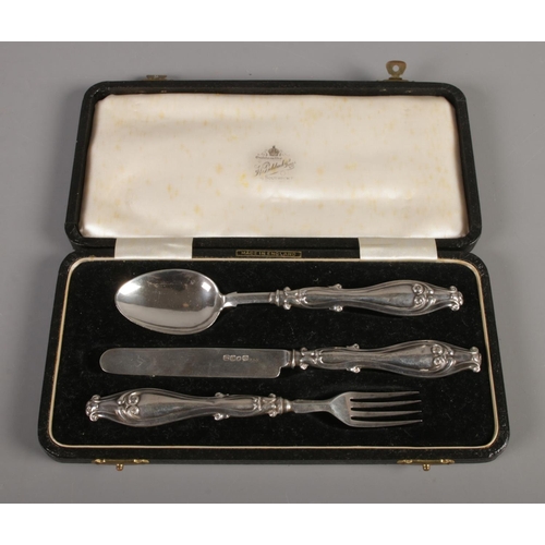 404 - A Victorian three piece silver Christening set, in case. Assayed for Birmingham, 1856 & 1857, by Hil... 