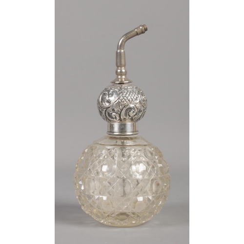 407 - A globular cut glass and silver scent bottle. Collar stamped for sterling silver. Height: 15.5cm.