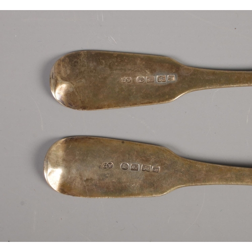 418 - Two silver basting spoons hallmarked Exeter 1822 by George Ferris. Total weight 109.6g.