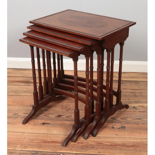 452 - A mahogany nest of four tables.