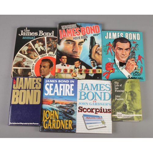 473 - A collection of James Bond books. Includes two annuals, movie book, John Gardner Seafire and Scorpiu... 