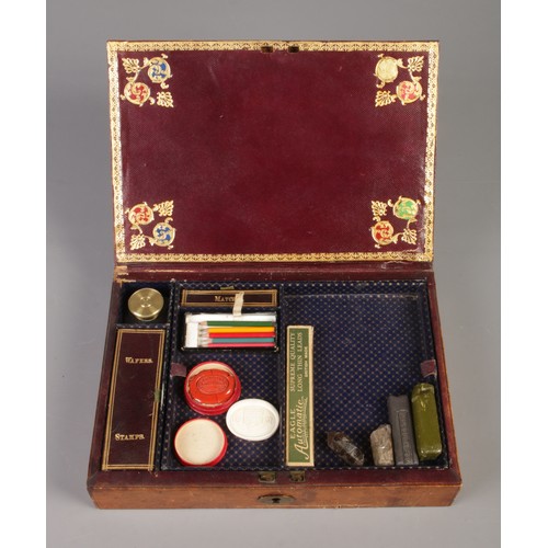 2 - A leather covered stationary box with painted and gilt decoration, fitted interior and contents of w... 