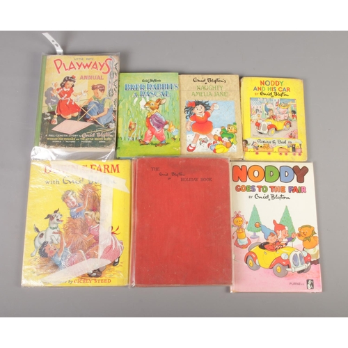 530 - A collection of Enid Blyton books. Includes Holiday Book, Playways Annual, Naughty Amelia Jane etc.