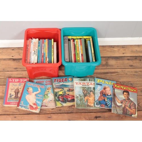 467 - Two boxes of annuals. Includes Tarzan, Tip-Top annual, football annuals, etc.